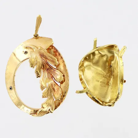 Klockboett 1 hänge defekter 18K  Vikt: 15,4 g