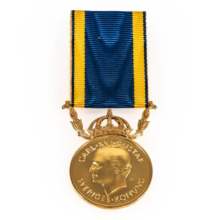 Förtjänstmedalj Ø27,5mm, namngravyr, 14K 15,1g inkl. band. 