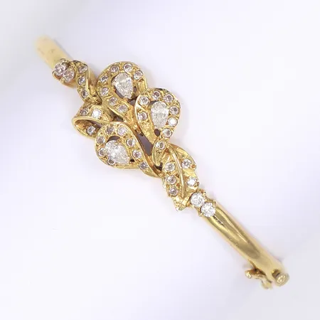 Stelt armband med vita stenar ca 60x55mm 18K Vikt: 17,4 g