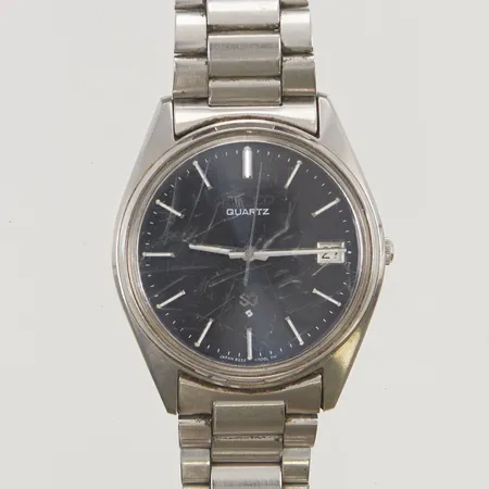 Herrur Seiko 33mm stål quartz går ej, repig, repigt glas.