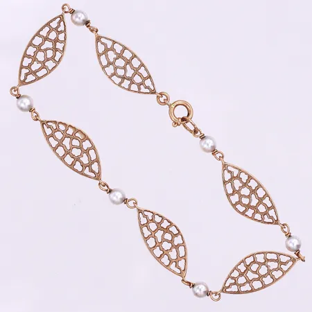 Armband med pärlor,Gustav Dahlgren & Co Malmö,längd ca 19.5 cm,bredd 3.9-8.9 mm,18k. Vikt: 7,8 g