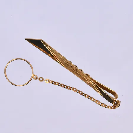 Slipsnål längd 5 cm, bredd 3-6 mm 18K. Vikt: 3,5 g