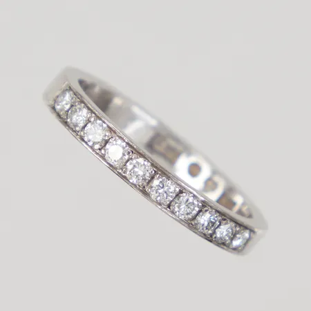 Ring halvallians med diamanter 10 x ca 0,03ct, stl;16¾, gravyr, vitguld 18K Vikt: 3,1 g