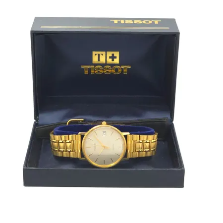 Herrur Tissot Seastar, 18K guld, Ø34 mm, quartz - behov av nytt batteri, gravyr, universal stållänk, originalbox, skinnband Tissot medföljer