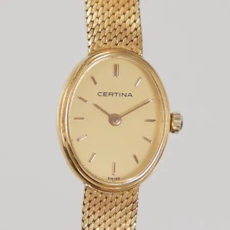 Damur Certina 18K, quartz, 20x16mm, boettnr: 153.9027.68, integrerad länk 18K, total längd ca 17cm, länken skev/bucklig, batteribyte krävs, bruttovikt: 24,3gr