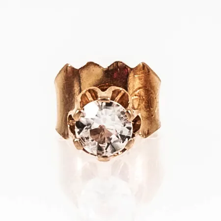 Ett udda örhänge vit sten Ø 4 mm 18K 0,4g. 