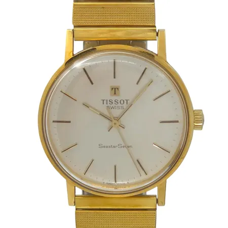 Herrur Tissot Seastar Seven, 18K guld, Ø34 mm, manuell, gravyr, universal stållänk, fint skick,  Vikt: 0 g