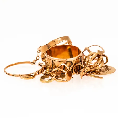 Diverse defekt/graverat guld 18K 9,1g. 