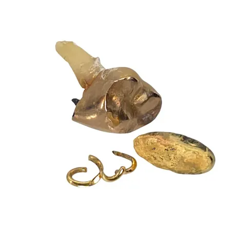 Tandguld, orensat, guldbit, cirka 18K, bruttovikt  Vikt: 6,7 g