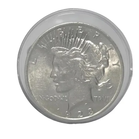 Mynt, silverdollar, (Peace Dollar), USA 1923, silver 900/1000, Ø38 mm, försvaras i myntkapsel  Vikt: 26,7 g