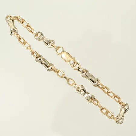 Armband tvåfärgat längd 21,5cm bredd 4-6mm (vissa länkdelar buckliga) 14K, 6,4g