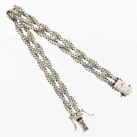 Armband flätad modell längd 18,5cm bredd 8,5mm, silver 835/1000. Vikt: 10,5 g