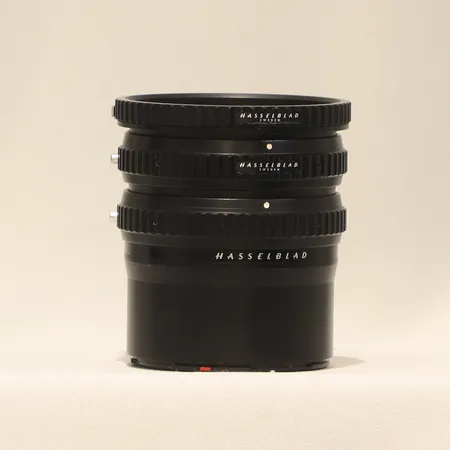 Kameradel Hasselblad s.k. "Mellanringar" för porträttfotografering, märkt "10" och "55", bredd 85mm och 74mm, längd 95mm, bruksslitage  Vikt: 0 g Skickas med postpaket.