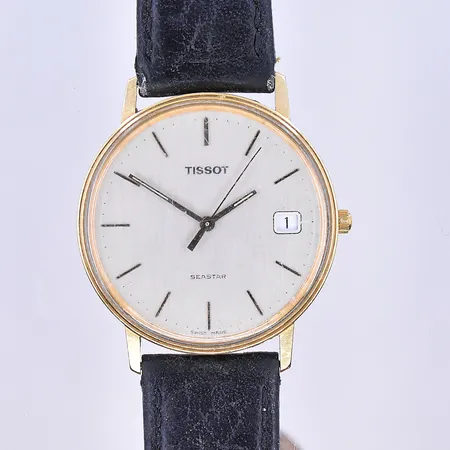 Herrur Tissot Seastar Ø34 mm, quartz datum graverad boett 18K.