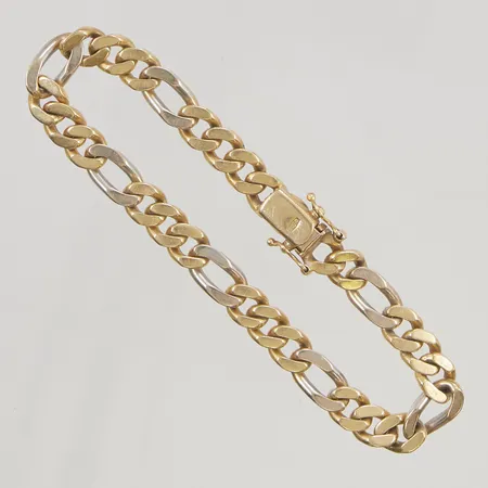 Armband Figaro 18,7cm bredd 7mm tvåfärgad 18K 25,7g.