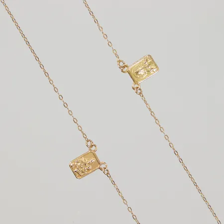 Collier Madonna längd ca 62cm, bredd 1mm, plattor 9x6mm, ej öppningsbar, ostämplad, 18K Vikt: 1,8 g