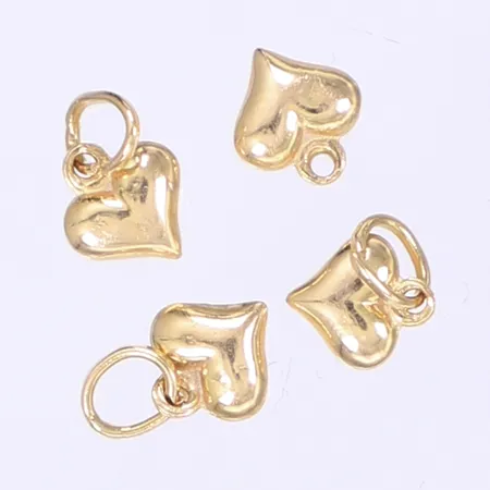 Fyra delar av ett smycke 18K Vikt: 0,7 g