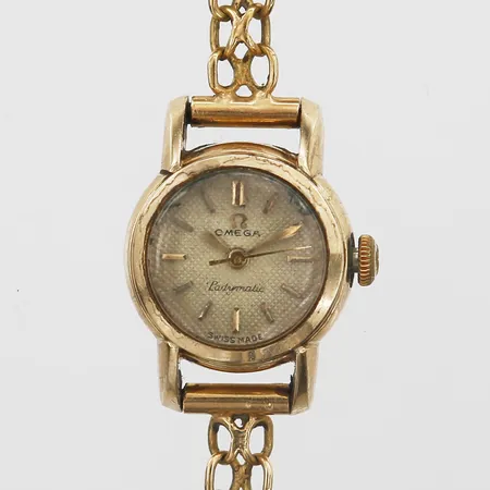 Damur Omega Ladymatic Ø18mm, manuell, plexiglas, boett i 14K, armband X-länk i 18K, servicebehov, slitage, bruttovikt 20,3g