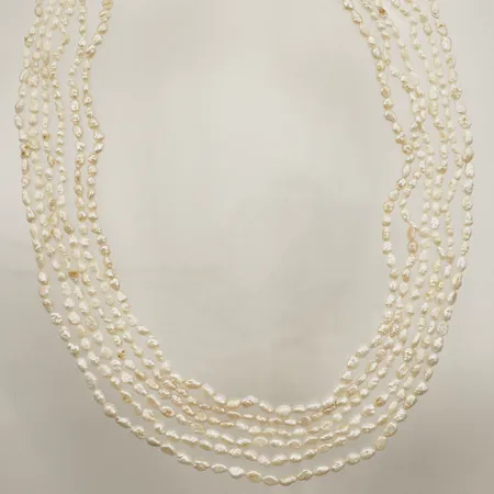 Pärlcollier, sexradigt odlade sötvattenspärlor barocka, längd 58,5cm, Ø 3mm bredd på lås 29,6mm 18K Vikt: 62,3 g