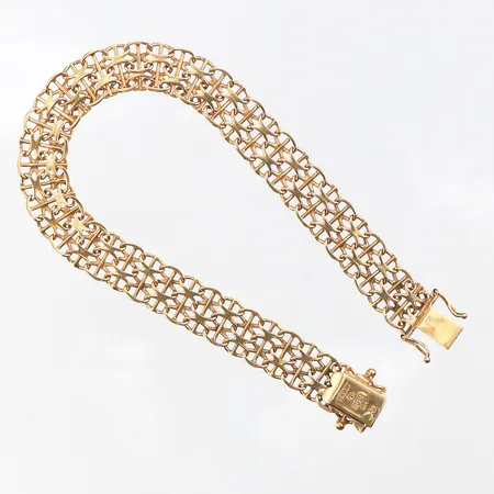 Armband X-länk med stav,Stockholms Ädelsmide AB,längd ca 19 cm,bredd 9.3 mm,18k. Vikt: 13,7 g