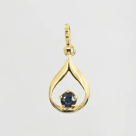Hänge med blå sten GHA längd 14mm, bredd 7mm, 18K. Vikt: 0,3 g