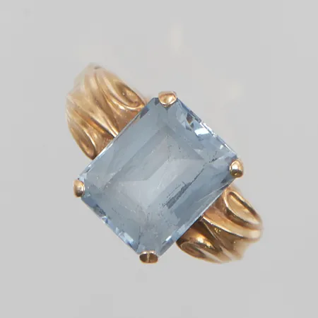 Ring stl:16½ bredd 10mm repig syntetisk spinell 18K 2,7g.