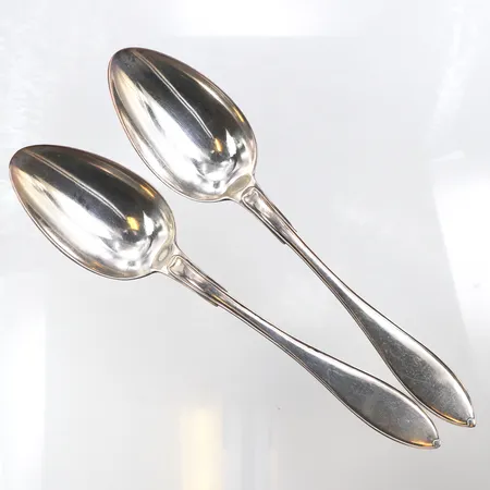 Matskedar 2 st med monogram,silver 830/1000. Vikt: 132 g