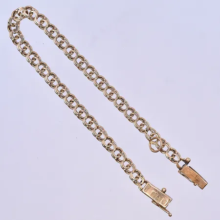 Armband Bismarck med en berlock ögla längd 18 cm, bredd 5 mm 18K. Vikt: 7,3 g