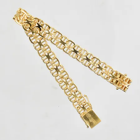 Armband X-länk med stav längd 18cm, bredd 9mm, 18K. Vikt: 18,7 g