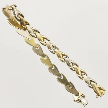 Armband, tvåfärgat, halvstelt, längd 19,5cm, bredd 6,4mm 18K  Vikt: 13,3 g