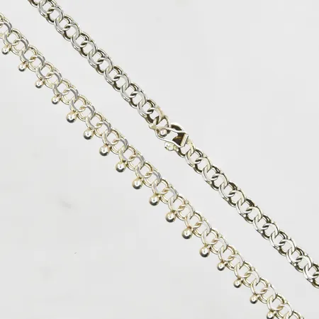 Collier med fasta droppar längd 44½ cm, länkens bredd 5mm, 830/1000 silver. Vikt: 15,9 g