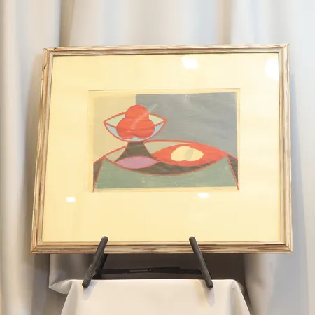 Tavla Jaakko Somersalo (1916-1966)  kolorerat träsnitt, stilleben med frukt, signerad och numrerad i blyerts 13/30 motivmått: 37x27cm, små veck samt tejp i hörnen, ramen i dåligt skick  Skickas med postpaket.