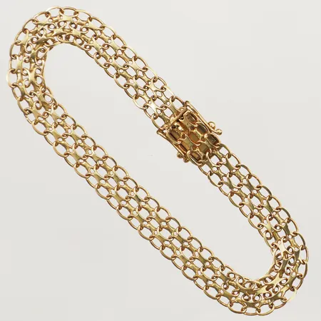 Armband X-länk längd 19cm, bredd 8mm, vriden länk, 18K Vikt: 9,3 g