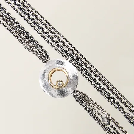 Collier Ole Lynggaard 4-radigt i silver 925/1000 längd 42,5cm bredd 9mm, guldlås Ø24,2mm med diamant ca 0,05ct samt safir, stämplad Ole L, 18K 14,7g, totalvikt 44,5g, med original etui