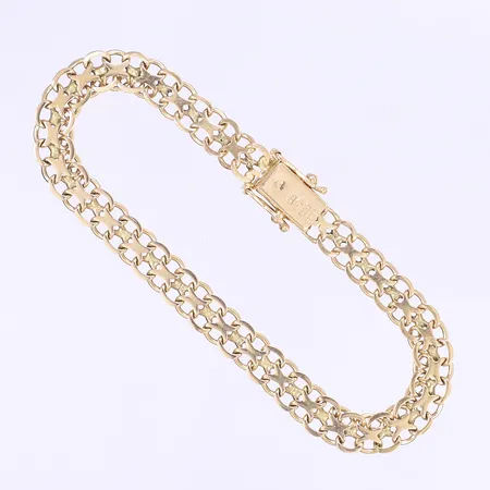 Armband X-länk 19cm, bredd 7mm, bruksslitage, 18K Vikt: 11,5 g