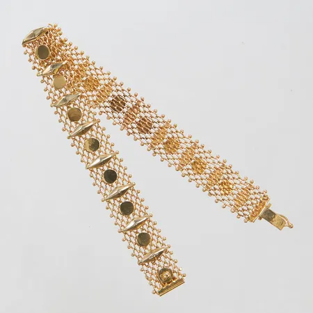 Armband längd ca 20cm bredd 13mm, buckla på dekor, 21K Vikt: 19,6 g