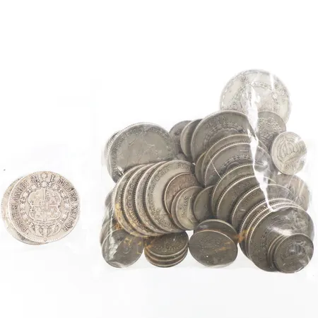 Cirkulationsmynt 15st1kr 40% silver, 7st 25 öre 40% silver, 10 öringar 35st 40% silver + 1kr 1942 med årtal under ansikte + 1kr 1939 80% silver,totalvikt 185.6 gram. Vikt: 185,6 g