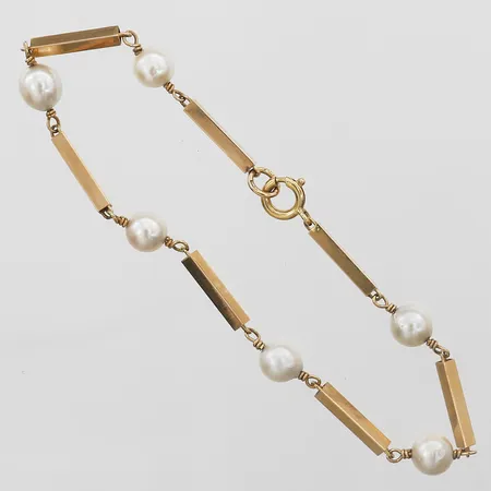 Armband med pärlor Ø6mm längd 19,5cm, bredd 2-6mm, 18K Vikt: 5 g