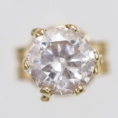 1 udda örhänge med vit sten Guldfynd Ø6,3mm 18K Vikt: 0,3 g