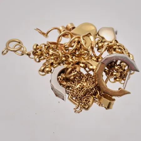 Diverse defekt guld, 18K, 7,86g.