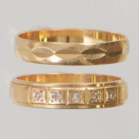 2 Ringar graverade 18K 4,6g.
