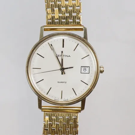 Herrur Certina 14K i boett, quartz. datum och länk i stål, gravyr, bruttovikt 