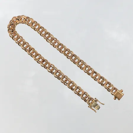 Armband Bismarck,slitage,längd ca 19 cm,bredd 5.7 mm,18k. Vikt: 13,9 g