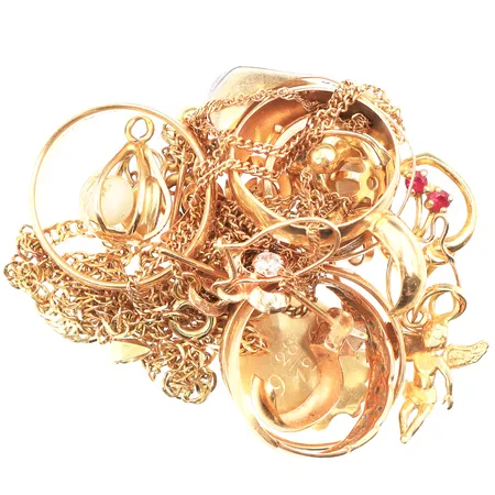 Trasigt guld,några stenar,18k. Vikt: 23,7 g