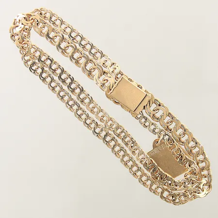 Armband Bismarck dubbelradigt med 1 berlock längd 19cm bredd 10mm, ostämplat 18K Vikt: 16,6 g