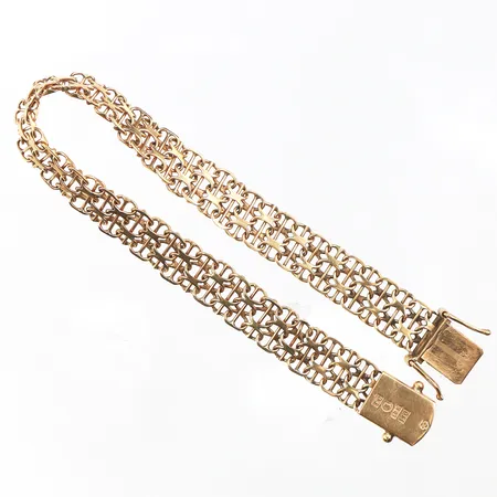 Armband X-länk,Tore Clareus Stockholm,längd ca 18.5 cm,bredd 8.8 mm,18k. Vikt: 10,8 g