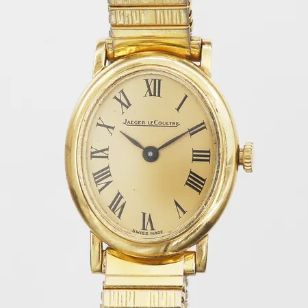 Damur Jaeger Le-Coultre 18K guld, manuell med flex-länk guld på stål ej original, referensnummer 9136-21, boettnummer 1445292, 22x24mm, slitage, ytliga repor, inga tillbehör.  Vikt: 0 g