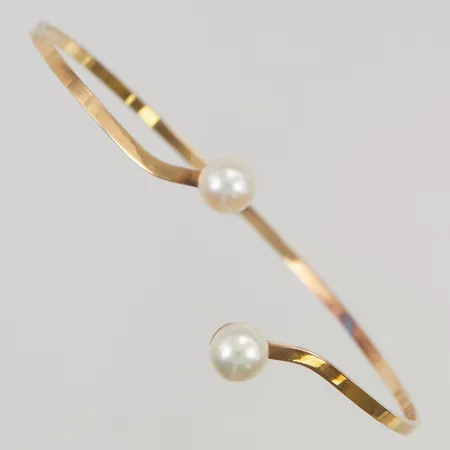 Armring öppen ca 65x60mm odladepärlor ca 6mm 18K 6,1g.