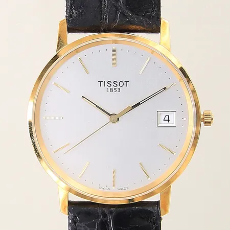 Herrur Tissot 18K quartz Ø34mm datum safirglas läderarmband manual går ej gravyr, etui 