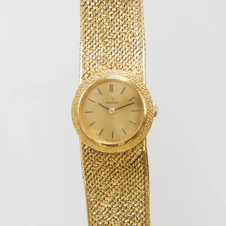 Damur Omega 18K Ø22mm manuell, integrerad länk i 18K, längd ca 18,5cm, bruttovikt 60,2g